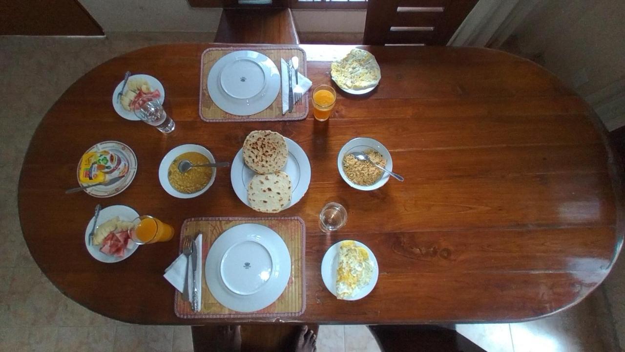 פראדניה Nisha Homestay Inn מראה חיצוני תמונה