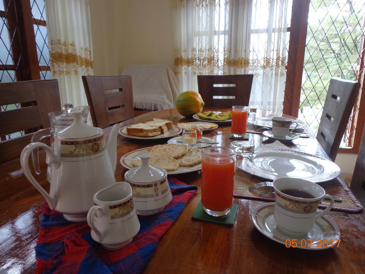 פראדניה Nisha Homestay Inn מראה חיצוני תמונה