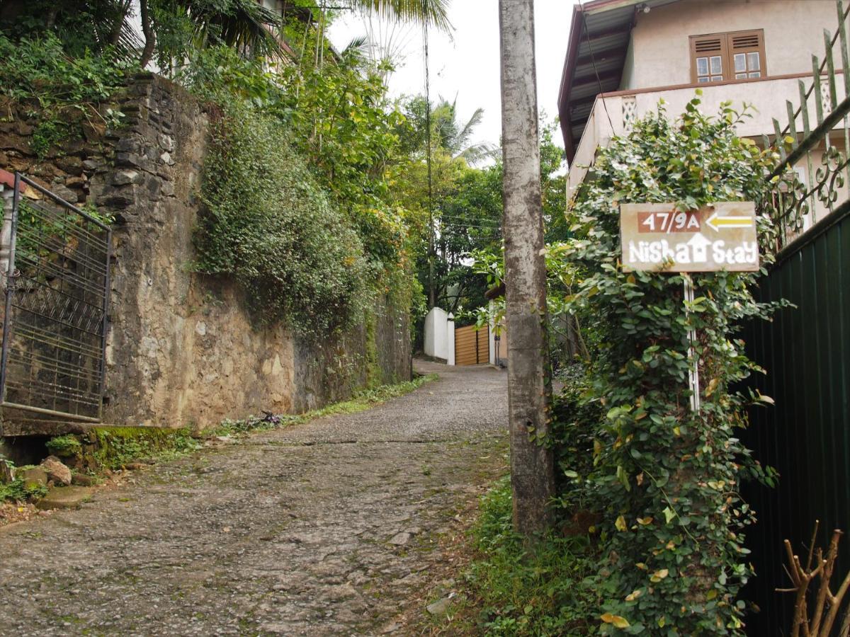 פראדניה Nisha Homestay Inn מראה חיצוני תמונה